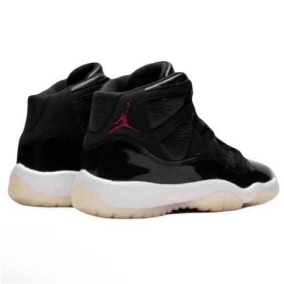Air Jordan 11 Retro 72-10 Black and White Sneakers